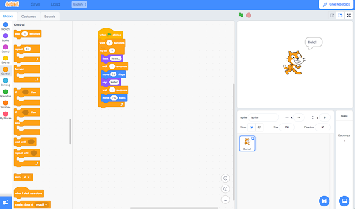 Scratch 3.0の編集画面。左にブロックパレット、中央に組んだスクリプト、右上のステージで猫のキャラクターが「Hello!」と発話